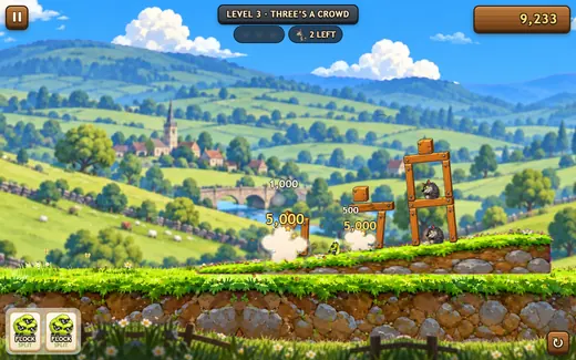 Seething Sheep in the Meadows: a flock of green sheep crashes into a wooden fort, with score popups of 5,000 over puffs of dust and a wolf still standing on the top floor.